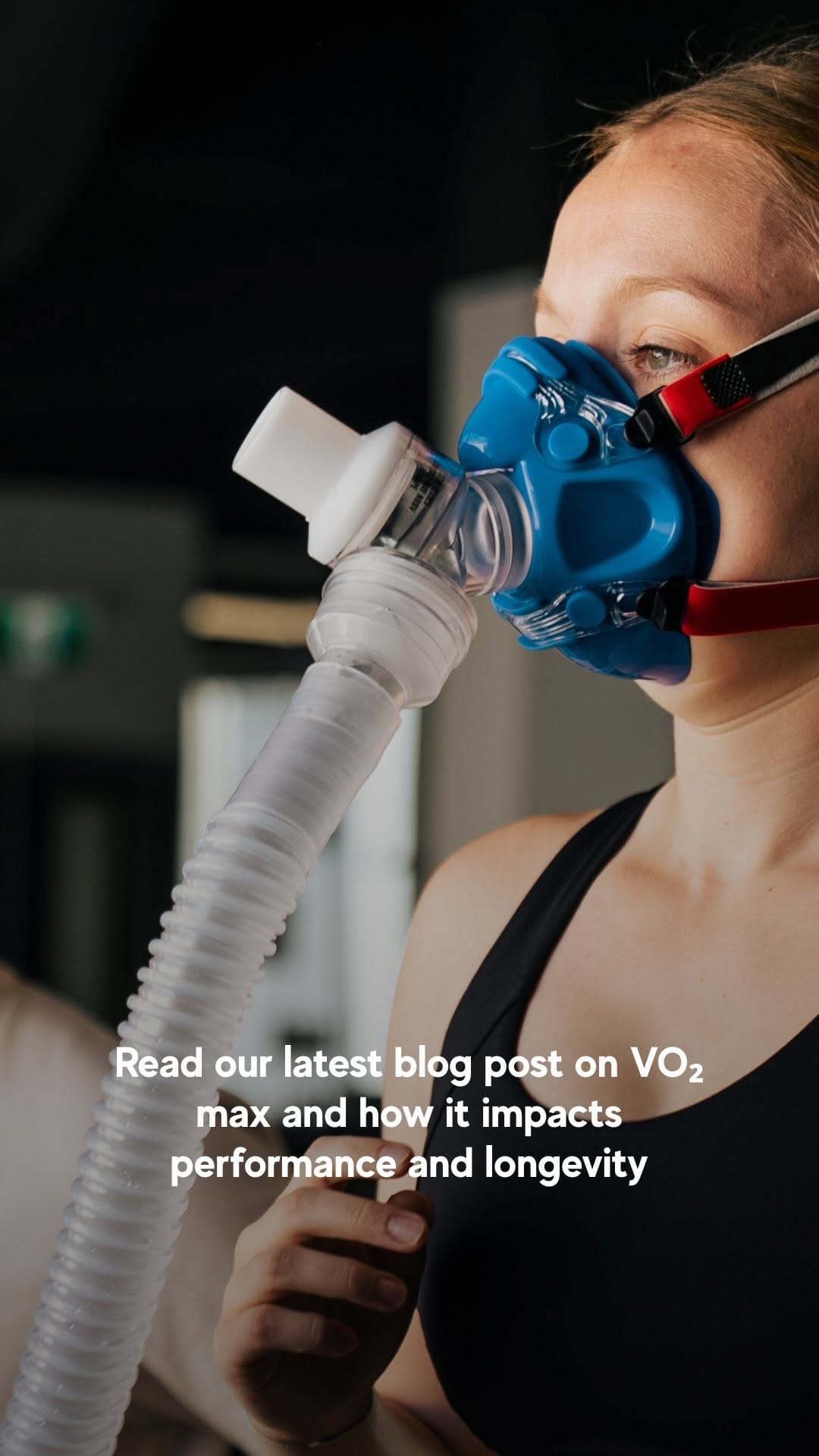 Client wearing a VO2 max testing mask, with a prompt to read our latest blog post